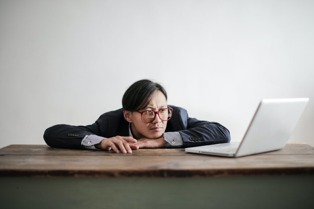 man looking at a computer